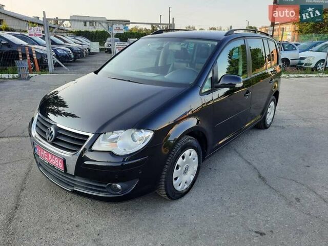 Черный Фольксваген Туран, объемом двигателя 1.6 л и пробегом 213 тыс. км за 8550 $, фото 7 на Automoto.ua