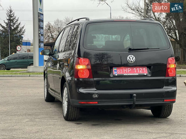 Черный Фольксваген Туран, объемом двигателя 1.6 л и пробегом 193 тыс. км за 7799 $, фото 24 на Automoto.ua