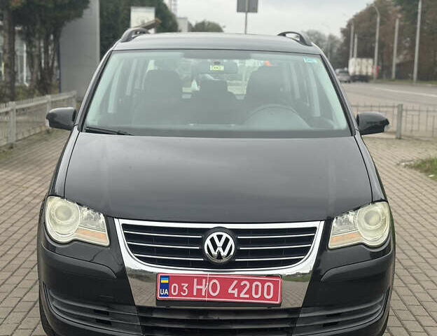 Чорний Фольксваген Туран, об'ємом двигуна 1.6 л та пробігом 260 тис. км за 6299 $, фото 1 на Automoto.ua