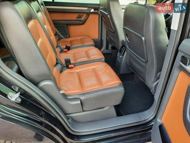 Черный Фольксваген Туран, объемом двигателя 1.6 л и пробегом 213 тыс. км за 8550 $, фото 130 на Automoto.ua