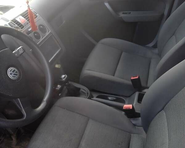 Черный Фольксваген Туран, объемом двигателя 1.9 л и пробегом 227 тыс. км за 7999 $, фото 2 на Automoto.ua