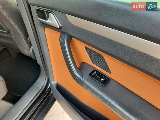 Черный Фольксваген Туран, объемом двигателя 1.6 л и пробегом 213 тыс. км за 8550 $, фото 129 на Automoto.ua