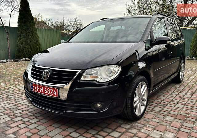Черный Фольксваген Туран, объемом двигателя 1.6 л и пробегом 176 тыс. км за 8198 $, фото 2 на Automoto.ua