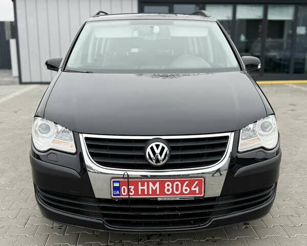 Черный Фольксваген Туран, объемом двигателя 1.4 л и пробегом 227 тыс. км за 7200 $, фото 3 на Automoto.ua