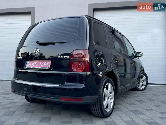 Чорний Фольксваген Туран, об'ємом двигуна 2 л та пробігом 292 тис. км за 8999 $, фото 40 на Automoto.ua