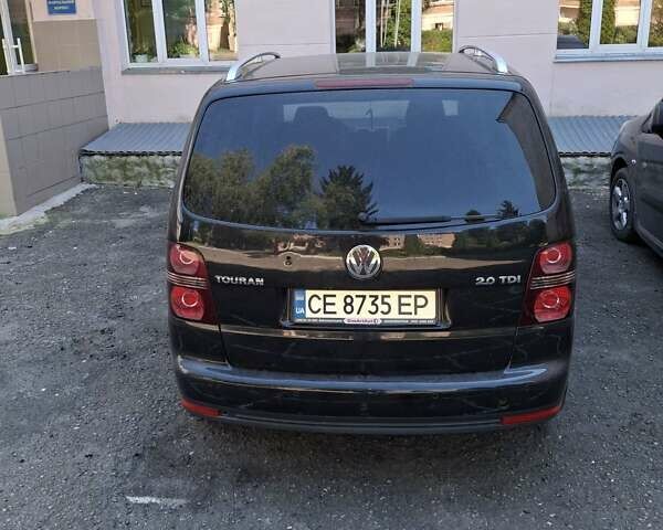 Черный Фольксваген Туран, объемом двигателя 1.98 л и пробегом 296 тыс. км за 7800 $, фото 16 на Automoto.ua