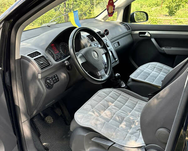 Черный Фольксваген Туран, объемом двигателя 1.39 л и пробегом 191 тыс. км за 8500 $, фото 6 на Automoto.ua