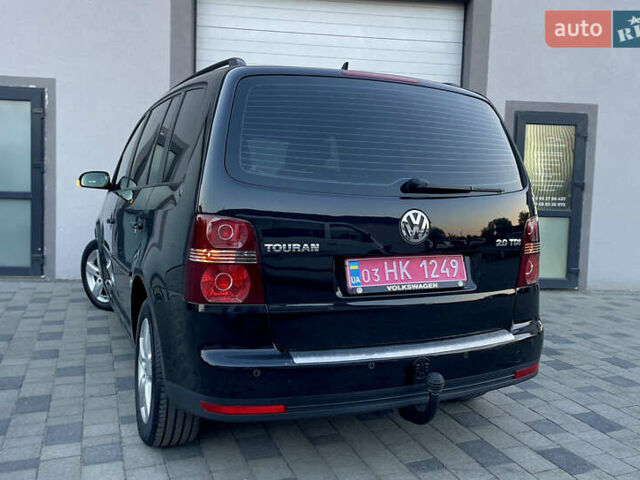 Чорний Фольксваген Туран, об'ємом двигуна 2 л та пробігом 292 тис. км за 8999 $, фото 26 на Automoto.ua
