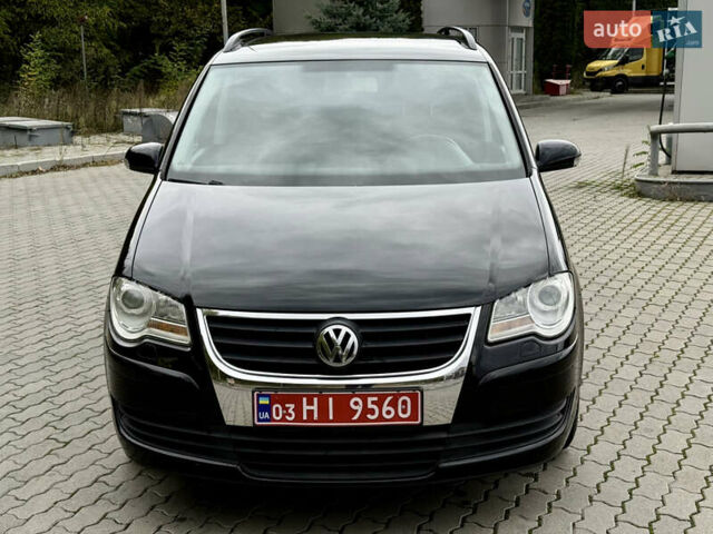 Черный Фольксваген Туран, объемом двигателя 1.6 л и пробегом 200 тыс. км за 7700 $, фото 3 на Automoto.ua