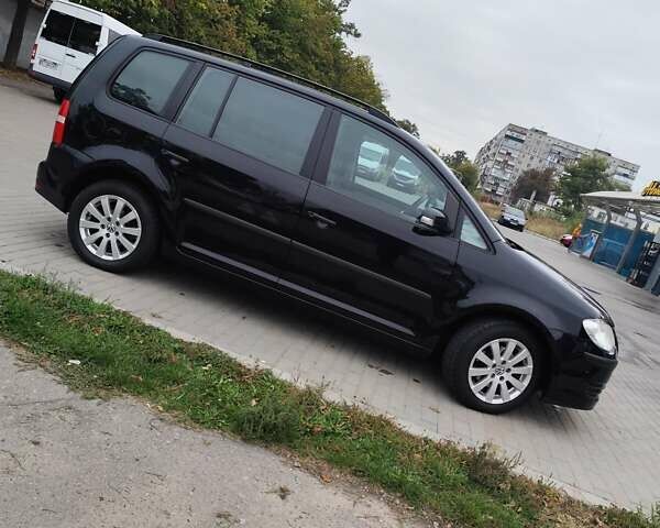 Чорний Фольксваген Туран, об'ємом двигуна 1.4 л та пробігом 194 тис. км за 6600 $, фото 3 на Automoto.ua