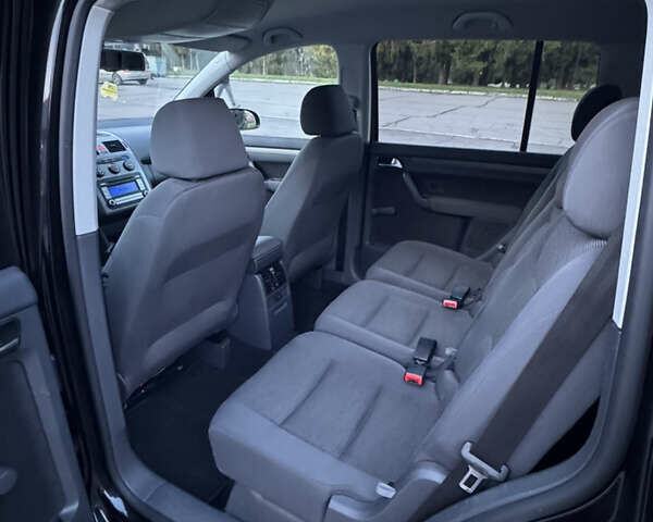 Черный Фольксваген Туран, объемом двигателя 1.4 л и пробегом 224 тыс. км за 6499 $, фото 22 на Automoto.ua