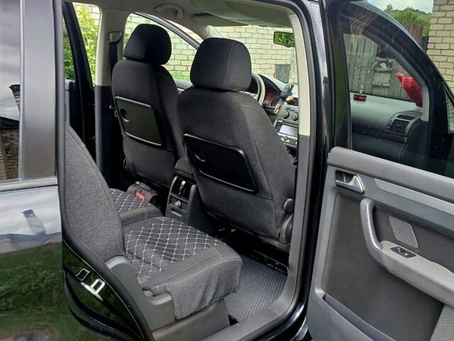 Черный Фольксваген Туран, объемом двигателя 1.4 л и пробегом 240 тыс. км за 6500 $, фото 4 на Automoto.ua