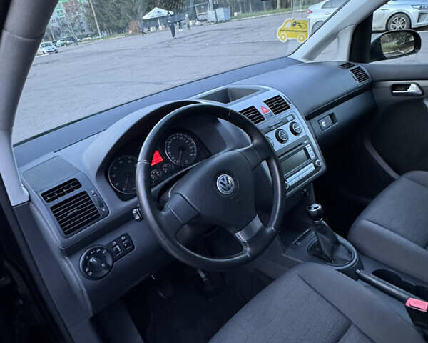 Черный Фольксваген Туран, объемом двигателя 1.4 л и пробегом 224 тыс. км за 6499 $, фото 19 на Automoto.ua