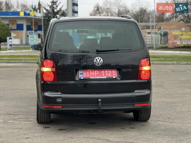 Черный Фольксваген Туран, объемом двигателя 1.6 л и пробегом 193 тыс. км за 7799 $, фото 25 на Automoto.ua