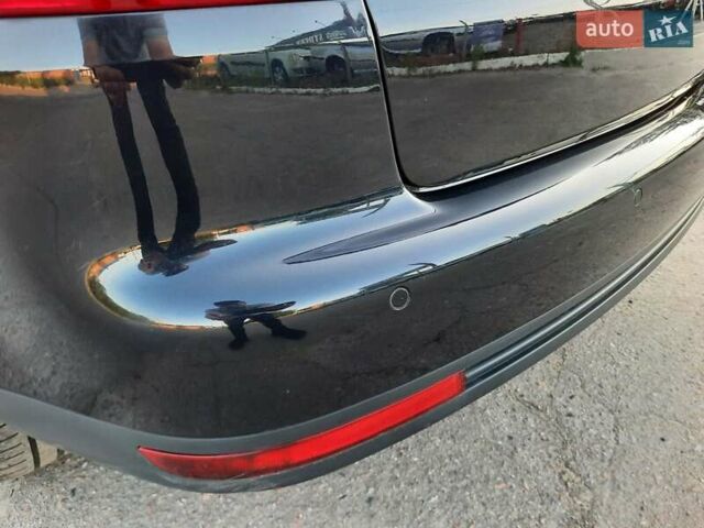 Черный Фольксваген Туран, объемом двигателя 1.6 л и пробегом 213 тыс. км за 8550 $, фото 108 на Automoto.ua