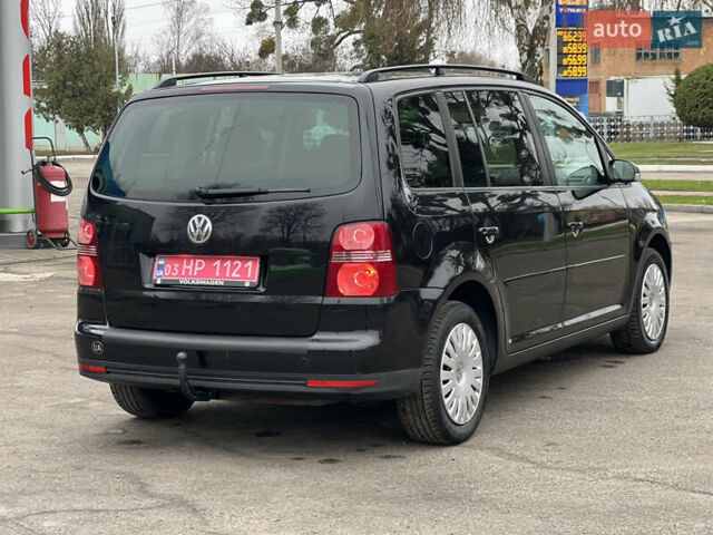 Черный Фольксваген Туран, объемом двигателя 1.6 л и пробегом 193 тыс. км за 7799 $, фото 18 на Automoto.ua