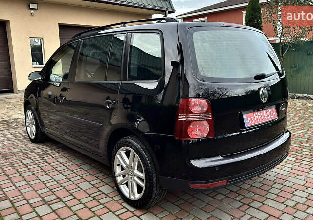 Черный Фольксваген Туран, объемом двигателя 1.6 л и пробегом 176 тыс. км за 8198 $, фото 4 на Automoto.ua
