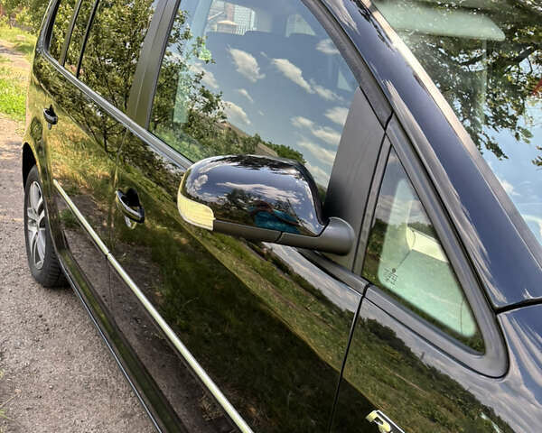 Черный Фольксваген Туран, объемом двигателя 1.39 л и пробегом 191 тыс. км за 8500 $, фото 23 на Automoto.ua