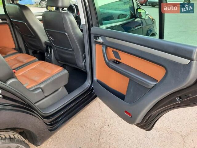 Черный Фольксваген Туран, объемом двигателя 1.6 л и пробегом 213 тыс. км за 8550 $, фото 128 на Automoto.ua