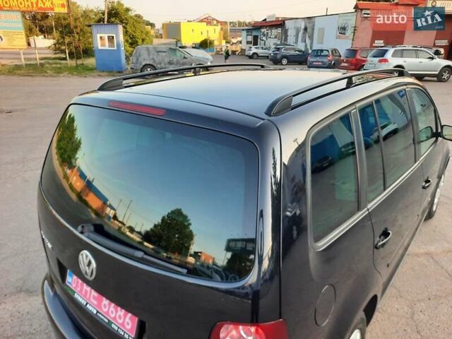 Черный Фольксваген Туран, объемом двигателя 1.6 л и пробегом 213 тыс. км за 8550 $, фото 115 на Automoto.ua