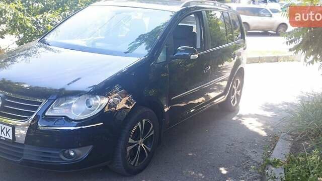 Чорний Фольксваген Туран, об'ємом двигуна 1.39 л та пробігом 220 тис. км за 6800 $, фото 4 на Automoto.ua