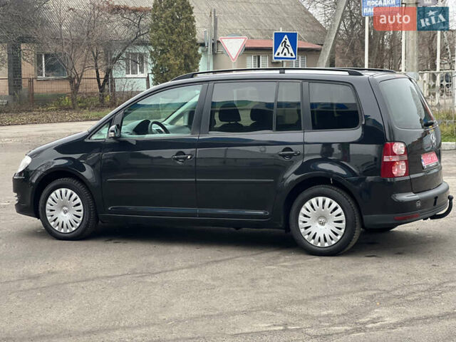 Черный Фольксваген Туран, объемом двигателя 1.6 л и пробегом 193 тыс. км за 7799 $, фото 8 на Automoto.ua