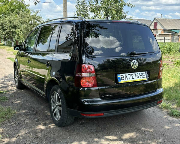 Черный Фольксваген Туран, объемом двигателя 1.39 л и пробегом 191 тыс. км за 8500 $, фото 5 на Automoto.ua