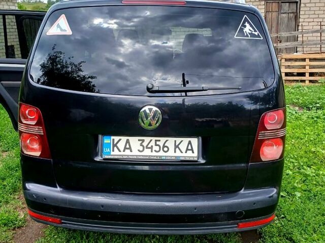 Черный Фольксваген Туран, объемом двигателя 1.4 л и пробегом 240 тыс. км за 6500 $, фото 5 на Automoto.ua