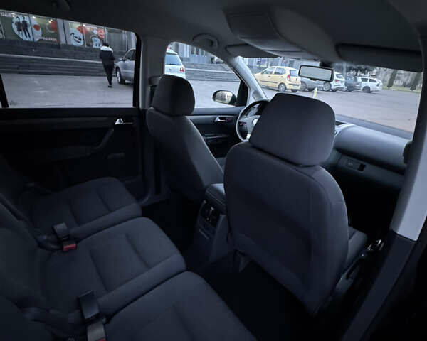 Черный Фольксваген Туран, объемом двигателя 1.4 л и пробегом 224 тыс. км за 6499 $, фото 38 на Automoto.ua