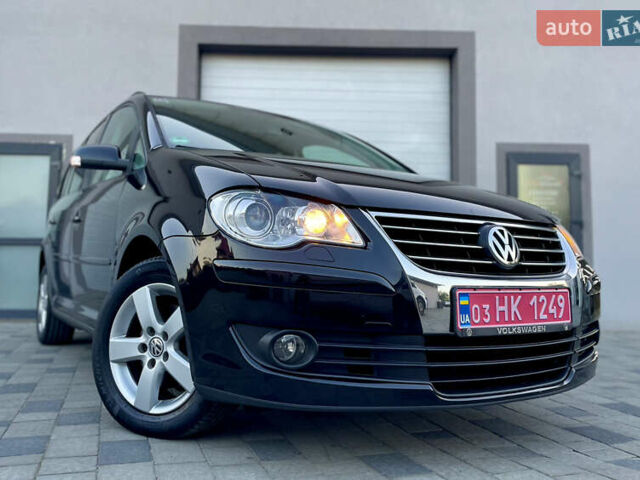 Чорний Фольксваген Туран, об'ємом двигуна 2 л та пробігом 292 тис. км за 8999 $, фото 19 на Automoto.ua