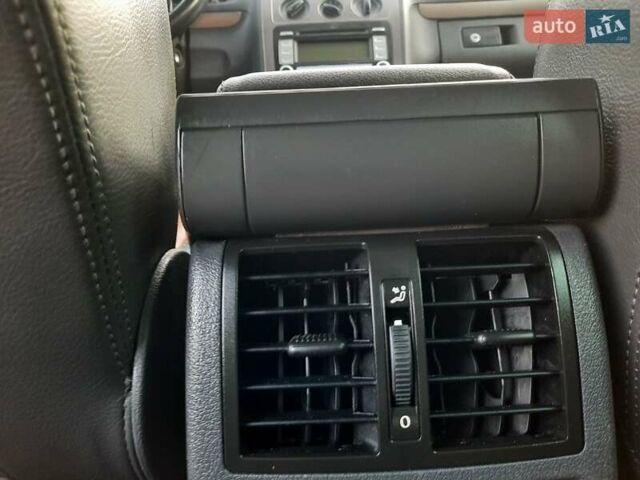 Черный Фольксваген Туран, объемом двигателя 1.6 л и пробегом 213 тыс. км за 8550 $, фото 86 на Automoto.ua