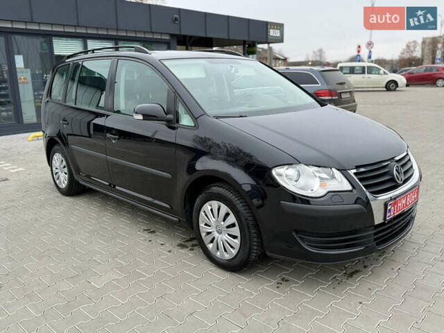 Черный Фольксваген Туран, объемом двигателя 1.4 л и пробегом 227 тыс. км за 7200 $, фото 22 на Automoto.ua