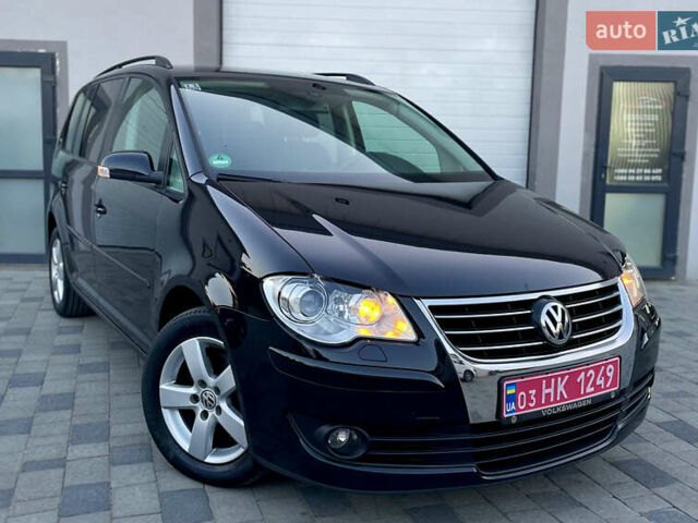 Чорний Фольксваген Туран, об'ємом двигуна 2 л та пробігом 292 тис. км за 8999 $, фото 7 на Automoto.ua