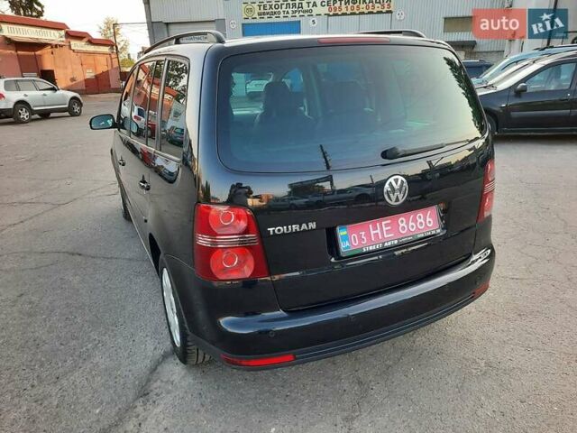Черный Фольксваген Туран, объемом двигателя 1.6 л и пробегом 213 тыс. км за 8550 $, фото 14 на Automoto.ua