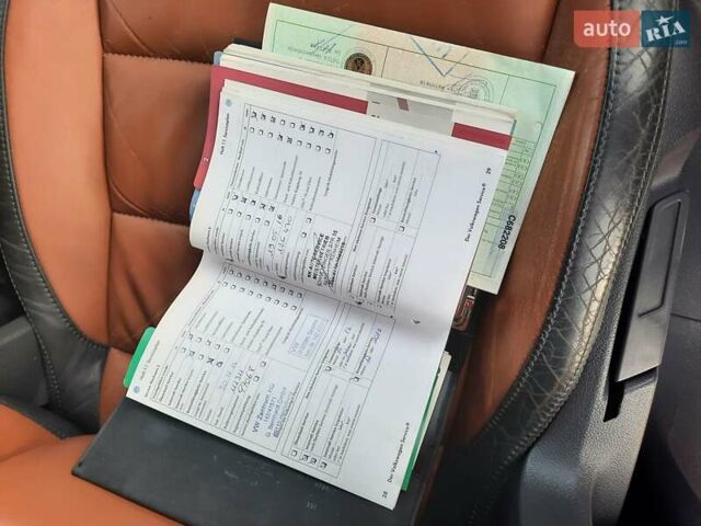 Черный Фольксваген Туран, объемом двигателя 1.6 л и пробегом 213 тыс. км за 8550 $, фото 147 на Automoto.ua