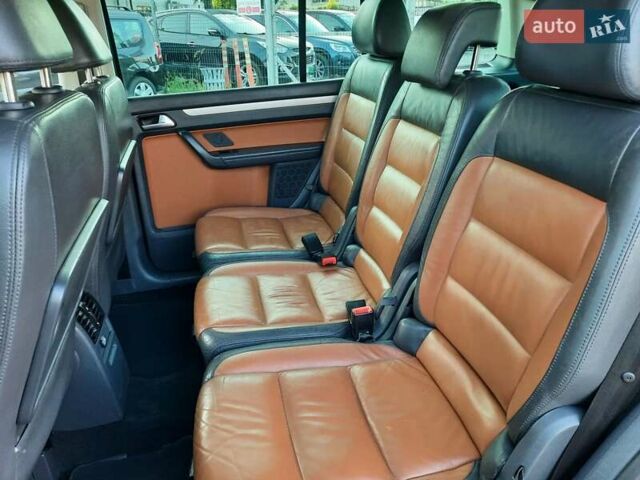 Черный Фольксваген Туран, объемом двигателя 1.6 л и пробегом 213 тыс. км за 8550 $, фото 81 на Automoto.ua