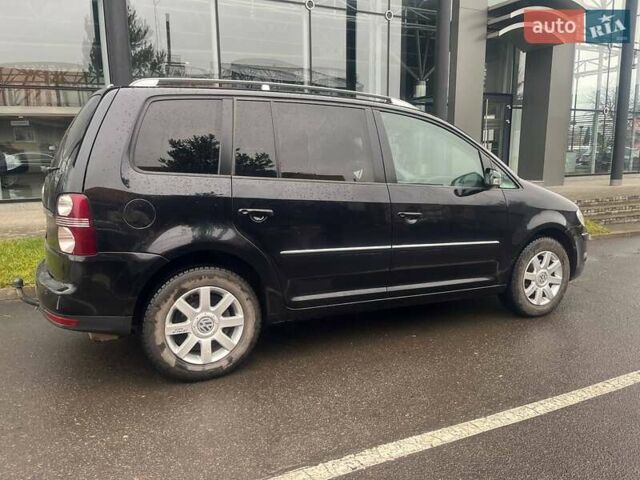 Черный Фольксваген Туран, объемом двигателя 2 л и пробегом 208 тыс. км за 7771 $, фото 6 на Automoto.ua