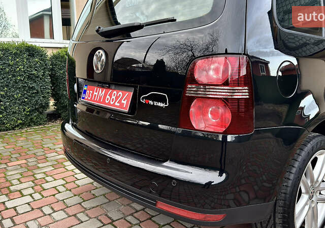 Черный Фольксваген Туран, объемом двигателя 1.6 л и пробегом 176 тыс. км за 8198 $, фото 21 на Automoto.ua