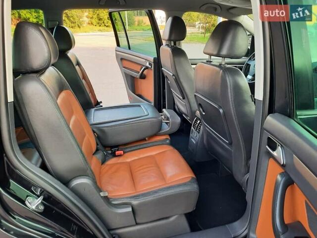 Черный Фольксваген Туран, объемом двигателя 1.6 л и пробегом 213 тыс. км за 8550 $, фото 97 на Automoto.ua