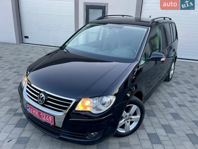Чорний Фольксваген Туран, об'ємом двигуна 2 л та пробігом 292 тис. км за 8850 $, фото 14 на Automoto.ua