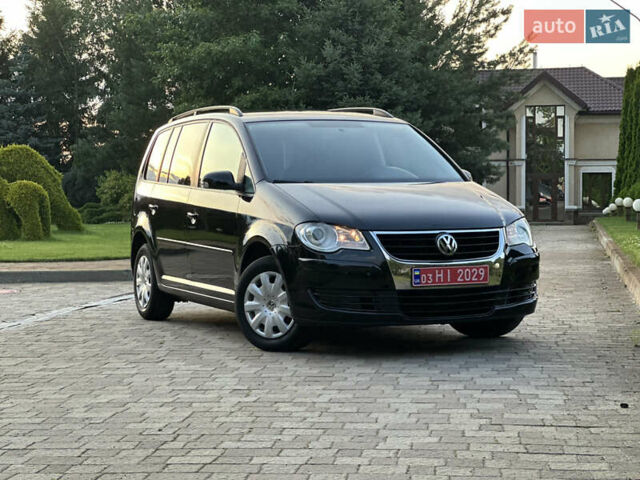 Черный Фольксваген Туран, объемом двигателя 1.6 л и пробегом 220 тыс. км за 7700 $, фото 3 на Automoto.ua
