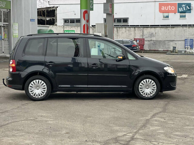 Черный Фольксваген Туран, объемом двигателя 1.6 л и пробегом 193 тыс. км за 7799 $, фото 14 на Automoto.ua