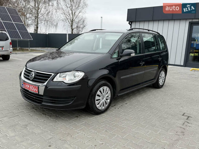 Черный Фольксваген Туран, объемом двигателя 1.4 л и пробегом 227 тыс. км за 7200 $, фото 4 на Automoto.ua
