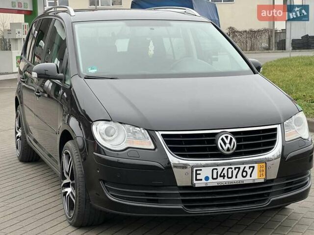 Чорний Фольксваген Туран, об'ємом двигуна 1.6 л та пробігом 147 тис. км за 8350 $, фото 1 на Automoto.ua