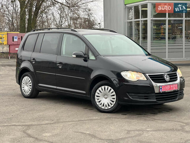 Черный Фольксваген Туран, объемом двигателя 1.6 л и пробегом 193 тыс. км за 7799 $, фото 9 на Automoto.ua