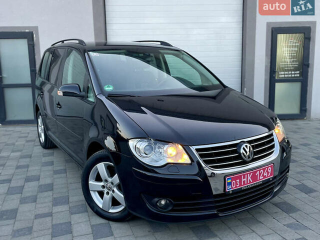 Чорний Фольксваген Туран, об'ємом двигуна 2 л та пробігом 292 тис. км за 8999 $, фото 20 на Automoto.ua