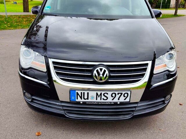 Черный Фольксваген Туран, объемом двигателя 2 л и пробегом 318 тыс. км за 2400 $, фото 5 на Automoto.ua