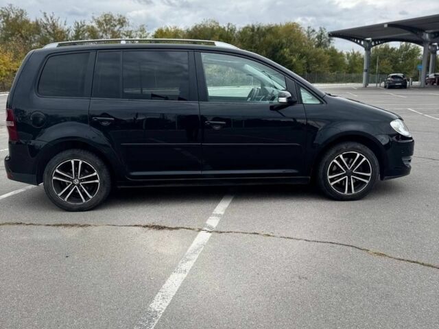 Черный Фольксваген Туран, объемом двигателя 1.4 л и пробегом 211 тыс. км за 7100 $, фото 3 на Automoto.ua