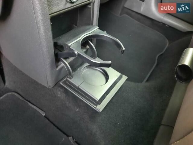 Черный Фольксваген Туран, объемом двигателя 1.6 л и пробегом 213 тыс. км за 8550 $, фото 87 на Automoto.ua