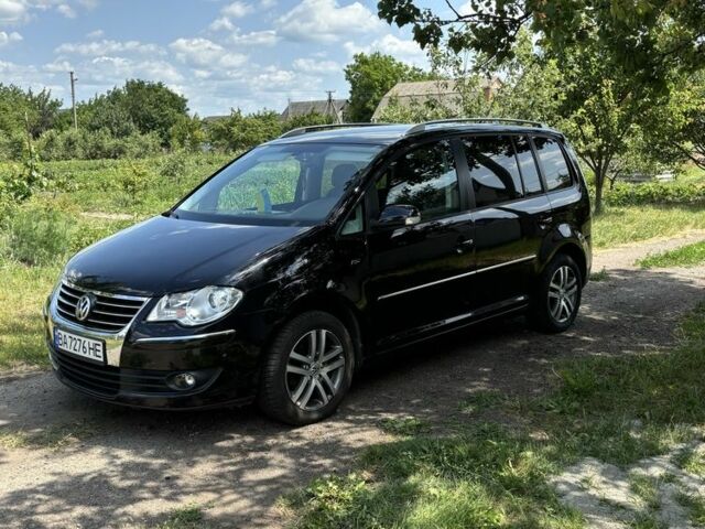 Черный Фольксваген Туран, объемом двигателя 1.4 л и пробегом 191 тыс. км за 8500 $, фото 8 на Automoto.ua